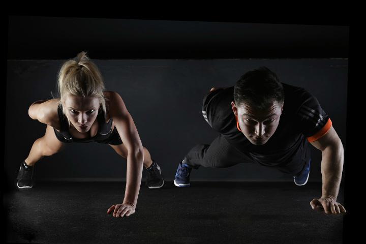 man and woman at fitness training