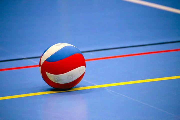 volleyball on blue floor