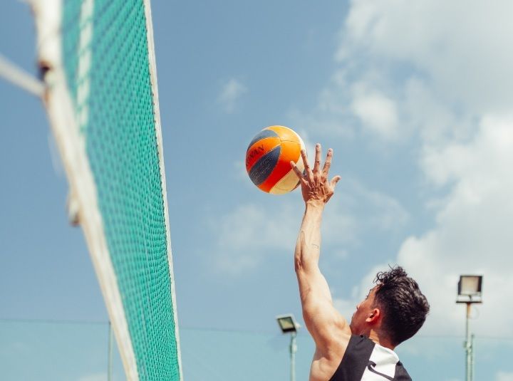 player hitting a volleyball
